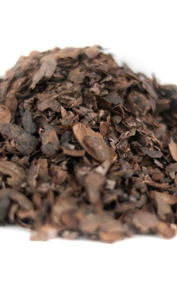 A pile of brewing cacao or cocoa tea, the skins of the cacao beans.